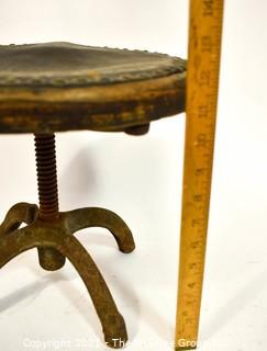 Primitive Stool with Cast Iron Swivel Base. 12" tall.
