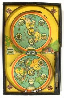 Antique Lindstrom Atlas Bagatelle or Pinball Game Made by Lindstrom Toy & Tool Company of Bridgeport, Connecticut. Double circle play with maps of the world top and bottom It measures 14” x 24” . 