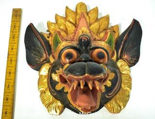 Bali or Indonesian Carved Wooden Dragon Mask. Measures 9" x 9" x 4".