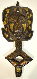 Hand Carved and Gilt Painted Tribal Mask with Handle Base. African. Ethnographic. Measures 19" x 9"