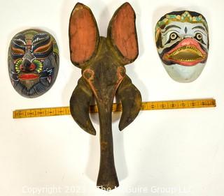 Three (3) Painted and Hand Carved Wooden Masks.  