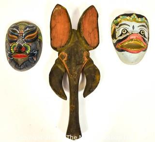 Three (3) Painted and Hand Carved Wooden Masks.  