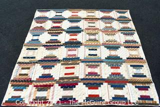 Vintage Hand Made Quilt in the Railroad Block Pattern. Measures 75" x 77".