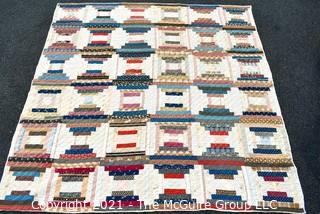 Vintage Hand Made Quilt in the Railroad Block Pattern. Measures 75" x 77".