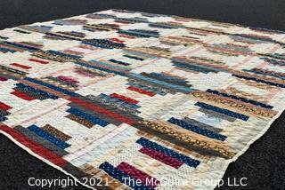 Vintage Hand Made Quilt in the Railroad Block Pattern. Measures 75" x 77".