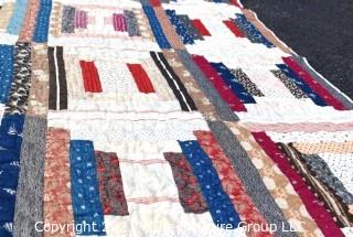 Vintage Hand Made Quilt in the Railroad Block Pattern. Measures 75" x 77".