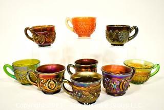 Nine (9) Vintage Carnival Glass Mugs in Various Colors. 