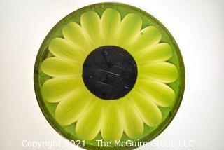 Mid Century Modern Lucite or Acrylic Large Green Sunflower Made by New Designs Inc, 1969.  It measures 16"D x 1" thick. 