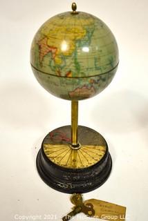 Antique Sanders Company World Globe Clock with Key.  Clock Face is on stand.  Measures 12" tall. 