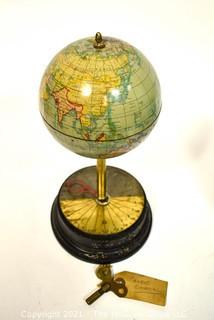 Antique Sanders Company World Globe Clock with Key.  Clock Face is on stand.  Measures 12" tall. 