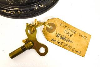 Antique Sanders Company World Globe Clock with Key.  Clock Face is on stand.  Measures 12" tall. 