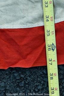 Vintage 48 Star American Flag with Cotton Stitched Stripes & Applique Stars. Measures 37" X 75”.