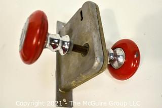 Art Deco Locking Mechanism with Red Handle Door Knob.