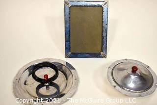 Blue Glass Mirror Frame and Two Chrome and Bakelite Serving Items.