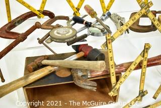 Assortment of Hand Tools, including folding rules, "C" Clamps, Vise Grips, hammers and mallets.