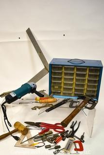 Assortment of tools including wooden mallet, hammer, metal shearing scissors, electric angle grinder and metal screw organizer bin