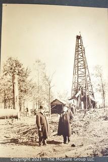 B & W Photo of Oil Tycoons in the Field; signed Charlette Brandt on Verso