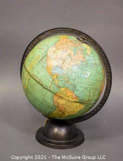 Vintage World Globe on Cast Iron Base.