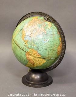 Vintage World Globe on Cast Iron Base.