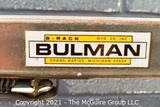 Four Paper Roll Vertical Dispenser Rack by Bulman. 