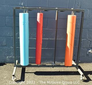 Four Paper Roll Vertical Dispenser Rack by Bulman. 