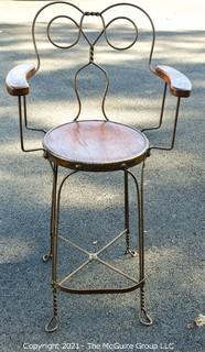 Antique Wrought Iron Twisted Metal Ice Cream Parlor Arm Chair with Wood Seat and Arms. 