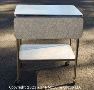 Vintage Mid Century Grey Marbled Formica Top Drop Leaf Table with Chrome Trim. 33" wide when leaves up, 30" tall.