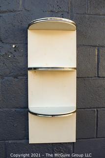 Vintage Art Deco White Metal Half Moon Wall Shelf with Chrome Trim.  Measures 7" x 13" x 30".