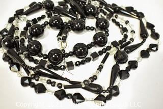 Five (5) Strands of Mixed Beads Including Black Onyx and Faceted Crystal Glass. 