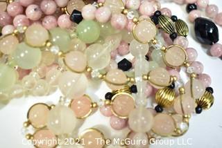 Seven (7) Strands of Mixed Stone Beads Including Bowenite, Rose Quartz and Black Faceted Glass. 