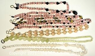 Seven (7) Strands of Mixed Stone Beads Including Bowenite, Rose Quartz and Black Faceted Glass. 