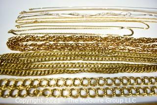 Nine (9) Gold Tone Costume Jewelry Chain Necklaces. 