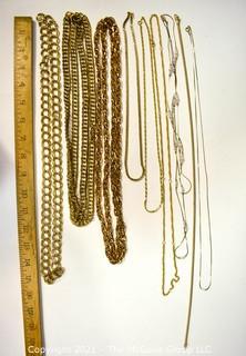 Nine (9) Gold Tone Costume Jewelry Chain Necklaces. 