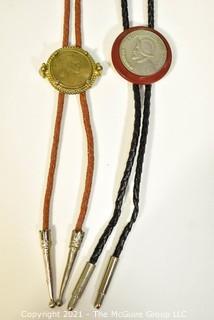 Two Bolo Ties featuring Coins