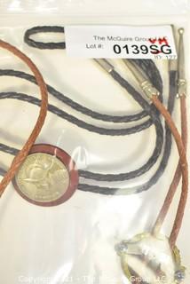 Two Bolo Ties featuring Coins