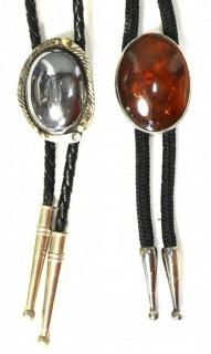 Two (2) Vintage Unmarked Sterling Silver Bolo Ties with Amber and Hematite Stones.