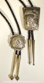 Two (2) Sterling Native American Artisan Made Bolo Ties.  One unmarked Sterling, One marked sterling and signed by Navajo artist Jereme Delgarito.