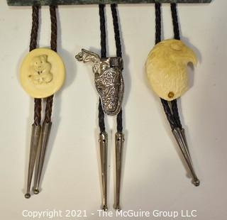 Three (3) Bolo Ties - Two Carved of Bone, One is Articulated Pistol with Holster. 