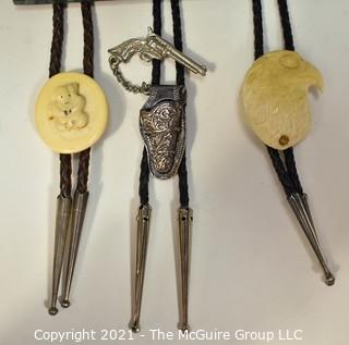 Three (3) Bolo Ties - Two Carved of Bone, One is Articulated Pistol with Holster. 