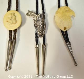 Three (3) Bolo Ties - Two Carved of Bone, One is Articulated Pistol with Holster. 