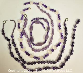 Four (4) Strands of Amethyst Beads, Various Lengths Between 24" and 13".