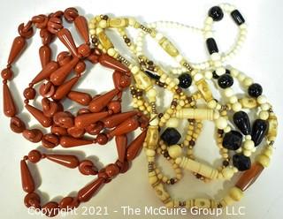 Four (4) Strands of Mixed Red Jasper and Bone Beads. 