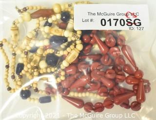 Four (4) Strands of Mixed Red Jasper and Bone Beads. 