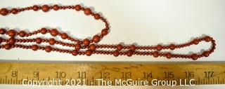 Two (2) Strands of Red Jasper Beads. 