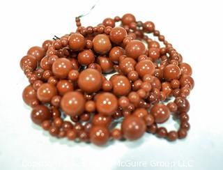 Two (2) Strands of Red Jasper Beads. 