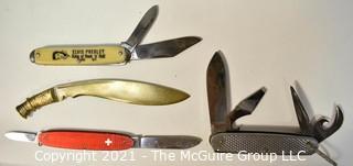 Collection of small pocket knives including U.S. Marine Corp and Elvis