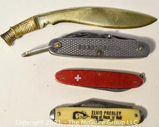 Collection of small pocket knives including U.S. Marine Corp and Elvis