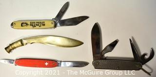 Collection of small pocket knives including U.S. Marine Corp and Elvis