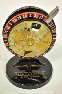 Vintage Brown & Bigelow Roulette Wheel Perpetual Desk Calendar.