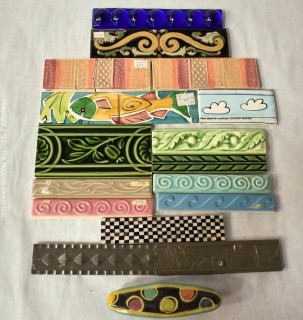 Group of Ceramic Hand Painted Tile Trims Border Pieces in Various Patterns.  Includes one Broken Tile. 